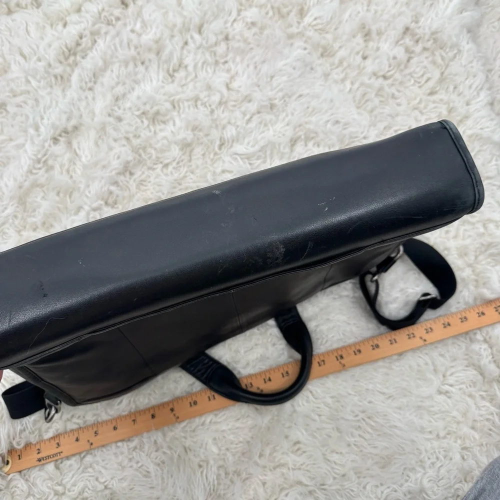Tumi Black Leather Briefcase with Expandable Pouches Compartments